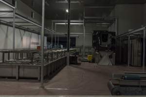 New killing/processing building containing large long scalding tank - Under construction at time of photos (2015). Gondolas much larger to gas many more pigs at once. Side of chamber opens, wall closes in to push pigs into gondola. - Captured at JBS Pork Australia (formerly Diamond Valley Pork), Laverton North VIC Australia.