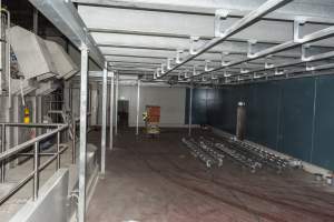 New killing/processing building containing giant gas chamber - Under construction at time of photos (2015). Gondolas much larger to gas many more pigs at once. Side of chamber opens, wall closes in to push pigs into gondola. - Captured at JBS Pork Australia (formerly Diamond Valley Pork), Laverton North VIC Australia.