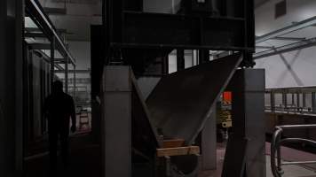 New killing/processing building containing giant gas chamber - Under construction at time of photos (2015). Gondolas much larger to gas many more pigs at once. Side of chamber opens, wall closes in to push pigs into gondola. - Captured at JBS Pork Australia (formerly Diamond Valley Pork), Laverton North VIC Australia.