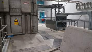 New killing/processing building containing giant gas chamber - Under construction at time of photos (2015). Gondolas much larger to gas many more pigs at once. Side of chamber opens, wall closes in to push pigs into gondola. - Captured at JBS Pork Australia (formerly Diamond Valley Pork), Laverton North VIC Australia.