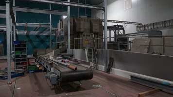 New killing/processing building containing giant gas chamber - Under construction at time of photos (2015). Gondolas much larger to gas many more pigs at once. Side of chamber opens, wall closes in to push pigs into gondola. - Captured at JBS Pork Australia (formerly Diamond Valley Pork), Laverton North VIC Australia.