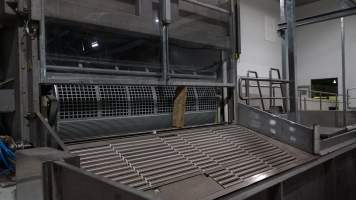 New killing/processing building containing giant gas chamber - Under construction at time of photos (2015). Gondolas much larger to gas many more pigs at once. Side of chamber opens, wall closes in to push pigs into gondola. - Captured at JBS Pork Australia (formerly Diamond Valley Pork), Laverton North VIC Australia.