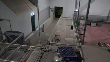 New killing/processing building containing giant gas chamber - Under construction at time of photos (2015). Gondolas much larger to gas many more pigs at once. Side of chamber opens, wall closes in to push pigs into gondola. - Captured at JBS Pork Australia (formerly Diamond Valley Pork), Laverton North VIC Australia.