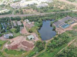 Drone flyover of Crocodylus park/zoo and hidden crocodile farm - Captured at Crocodylus Park Farm & Abattoir, Knuckey Lagoon NT Australia.