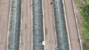 Cages at hidden Crocodylus crocodile farm - Drone flyover - Captured at Crocodylus Park Farm & Abattoir, Knuckey Lagoon NT Australia.