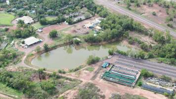 Drone flyover of Crocodylus park/zoo and hidden crocodile farm - Captured at Crocodylus Park Farm & Abattoir, Knuckey Lagoon NT Australia.
