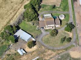 Drone flyover of free-range egg farm - Layer hens seen outside - Captured at Free-range egg farm (Peter & Cheryl King), Lethbridge VIC Australia.