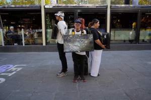 Mother's Day: Dominion Outreach Melbourne: 11 May 2025 - Animal rights activists participating in a street outreach event in Southbank, Victoria, Australia. Volunteers give out free vegan treats, show footage from Farm Transparency Project's dairy investigations, and engage the public in conversations, bringing awareness to the hidden reality of what happens to cows, calves, and bulls in the Australian dairy industry. - Captured at VIC.