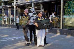 Mother's Day: Dominion Outreach Melbourne: 11 May 2025 - Animal rights activists participating in a street outreach event in Southbank, Victoria, Australia. Volunteers give out free vegan treats, show footage from Farm Transparency Project's dairy investigations, and engage the public in conversations, bringing awareness to the hidden reality of what happens to cows, calves, and bulls in the Australian dairy industry. - Captured at VIC.