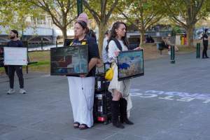 Mother's Day: Dominion Outreach Melbourne: 11 May 2025 - Animal rights activists participating in a street outreach event in Southbank, Victoria, Australia. Volunteers give out free vegan treats, show footage from Farm Transparency Project's dairy investigations, and engage the public in conversations, bringing awareness to the hidden reality of what happens to cows, calves, and bulls in the Australian dairy industry. - Captured at VIC.
