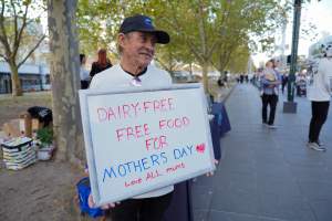 Mother's Day: Dominion Outreach Melbourne: 11 May 2025 - Animal rights activists participating in a street outreach event in Southbank, Victoria, Australia. Volunteers give out free vegan treats, show footage from Farm Transparency Project's dairy investigations, and engage the public in conversations, bringing awareness to the hidden reality of what happens to cows, calves, and bulls in the Australian dairy industry. - Captured at VIC.