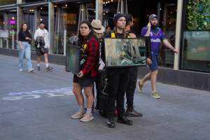 Mother's Day: Dominion Outreach Melbourne: 11 May 2025 - Animal rights activists participating in a street outreach event in Southbank, Victoria, Australia. Volunteers give out free vegan treats, show footage from Farm Transparency Project's dairy investigations, and engage the public in conversations, bringing awareness to the hidden reality of what happens to cows, calves, and bulls in the Australian dairy industry. - Captured at VIC.