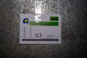 Sign at Farm Pride pullet farm - Photographs taken at the Farm Pride pullet farm, next door to their free-range egg farm.
Although described as 'free-range' young hens, known as pullets, were discovered confined to battery cages, strikingly similar to those found on cage egg farms. Hens are introduced into the laying sheds at between 18-20 weeks and will remain there until their laying slows at 12-18 months old. This means that, for up to a quarter of their life, these 'free-range' chickens will live in small, wire cages with no access to the outdoors. 18 months old 'spent' hens are sent to the slaughterhouse where they will be killed and turned into cheap meat products.
- Captured at Farm Pride Bears Lagoon - Pullet raising, Bears Lagoon VIC Australia.