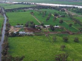 Drone flyover - Drone flyover of unknown dairy showing calf sheds and milking shed. - Captured at Unnamed Devondale Dairy, Woods Point SA Australia.