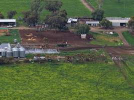 Drone flyover - Drone flyover of unknown dairy showing calf sheds and milking shed. - Captured at Unnamed Devondale Dairy, Woods Point SA Australia.