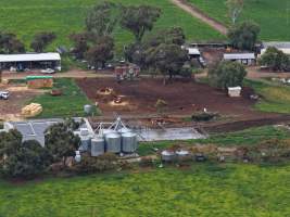 Drone flyover - Drone flyover of unknown dairy showing calf sheds and milking shed. - Captured at Unnamed Devondale Dairy, Woods Point SA Australia.
