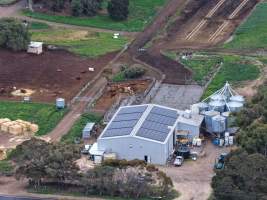 Drone flyover - Drone flyover of unknown dairy showing calf sheds and milking shed. - Captured at Unnamed Devondale Dairy, Woods Point SA Australia.