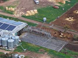 Drone flyover - Drone flyover of unknown dairy showing calf sheds and milking shed. - Captured at Unnamed Devondale Dairy, Woods Point SA Australia.