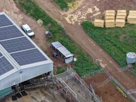 Drone flyover - Drone flyover of unknown dairy showing calf sheds and milking shed. - Captured at Unnamed Devondale Dairy, Woods Point SA Australia.