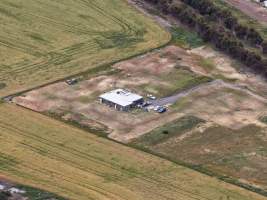 Drone flyover of broiler (meat) chicken farm - Captured at Pavilion Farm 6, Anakie VIC Australia.