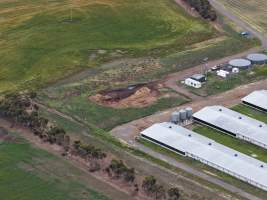 Drone flyover of broiler (meat) chicken farm - Captured at Pavilion Farm 1, Anakie VIC Australia.