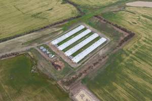 Drone flyover of broiler (meat) chicken farm - Captured at Pavilion Farm 1, Anakie VIC Australia.