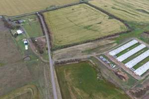 Drone flyover of broiler (meat) chicken farm - Captured at Pavilion Farm 1, Anakie VIC Australia.